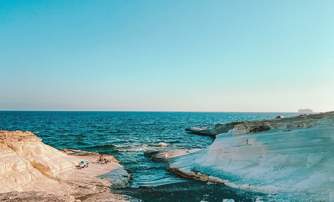White Stones Beach in Cyprus, known for its wild, rugged beauty and dramatic coastal scenery
